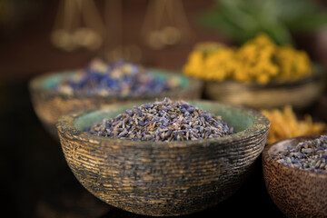 Natural remedy and mortar, healing herbs background