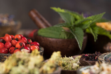 Natural remedy and mortar, healing herbs background