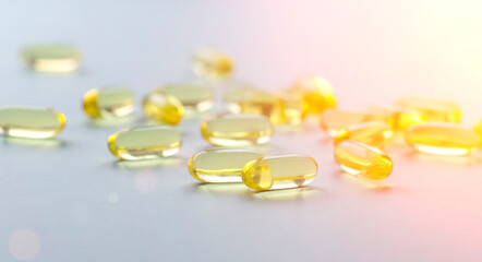 Omega fish oil background. Omega vitamins in yellow pills as a source of health