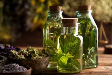 Oil, Natural remedy, healing herbs background