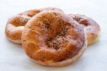 Ramadan pita on a white background. Traditional Ramadan flavors. Ramazan pidesi
