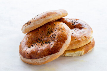 Ramadan pita on a white background. Traditional Ramadan flavors. Ramazan pidesi