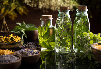 Oil, Natural remedy, healing herbs background