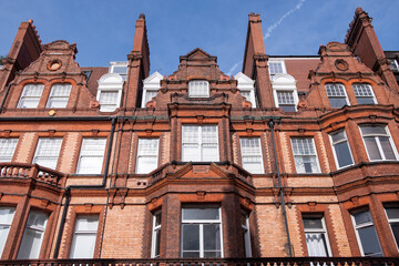 Typical red brick Kensington mansion townhouse buildings in south west London 