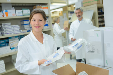 hospital pharmacist with newly delivered supplies
