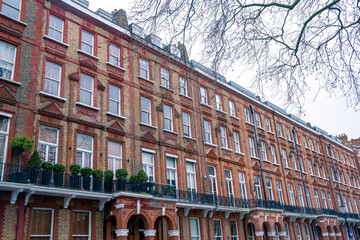 Obraz premium Grand Georgian red brick townhouses in Kensington, London 
