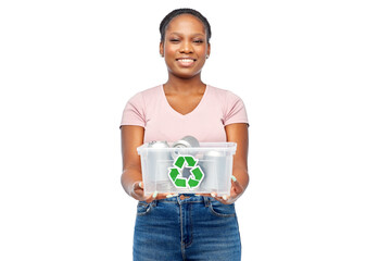 metal recycling, waste sorting and sustainability concept - happy african american woman holding plastic box with tin cans over white background