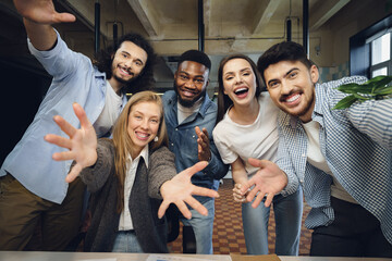 Happy overjoyed business team celebrate corporate victory