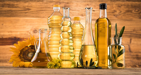 Cooking oils, Olive oil, Rape, Sunflower flowers in bottles