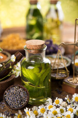 Oil, Natural remedy, healing herbs background