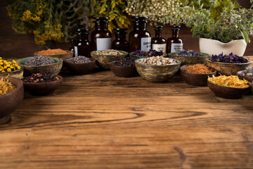 Obraz na płótnie Canvas Natural remedy and mortar, healing herbs background