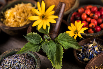 Natural remedy and wooden table background