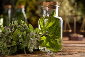 Natural remedy and mortar, healing herbs background