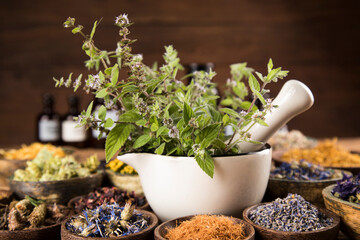 Natural remedy, mortar and herbs