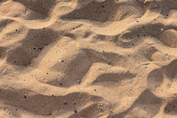 Beautiful natural sand of beach background at sunset