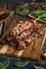 Mount of turkey Moorish skewer with peppers, bbq sauce and peppercorns