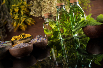 Oil, Natural remedy, healing herbs background