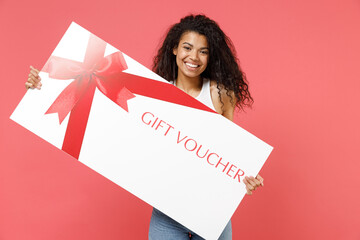 Young fun excited happy satisfied student african american woman 20s wearing casual basic white...