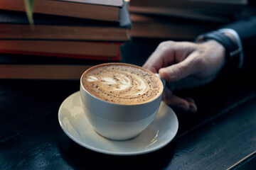 Cup of coffee cappuccino close-up cafe breakfast