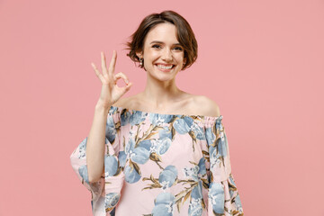 Young smiling happy stylish fun satisfied caucasian woman 20s with short hairdo wear trendy blouse...