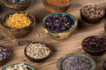 Natural remedy and mortar, healing herbs background