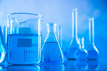 Laboratory beakers,Science experiment, blue background