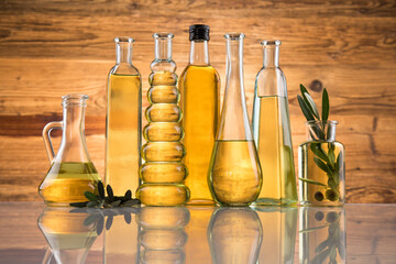 Olive oil bottles, olive branch and Cooking oils