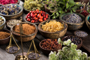 Natural remedy and wooden table background
