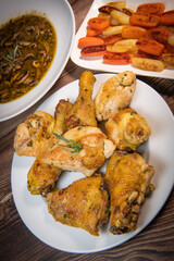 Chicken Hunter recipe with glazed root vegetables, carrot, turnip with its mushroom sauce deglazed in white wine and wet with the chicken stock