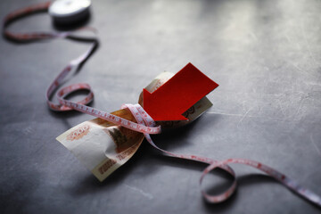 Business concept. The depreciation of the national currency. Bill with the inscription 