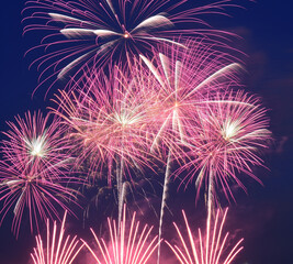 Fireworks with sparks on deep blue sky