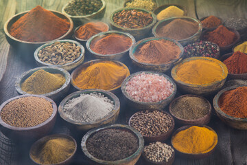 Colorful spices in bowl background