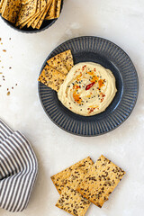 Hummus made from chickpeas. Hummus with chips and lemon. Healthy food