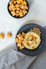 Hummus made from chickpeas. Hummus with chips and lemon. Healthy food