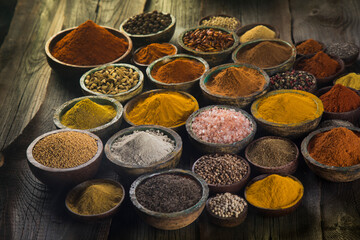 Aromatic spices on wooden background