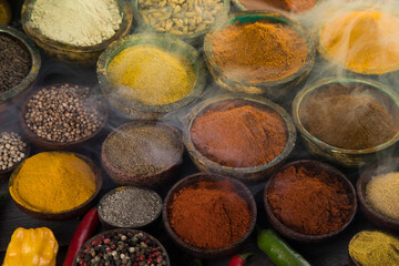 Spices and herbs in wooden bowl Colorful spices
