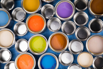 Fototapeta premium Group of tin metal cans with color paint