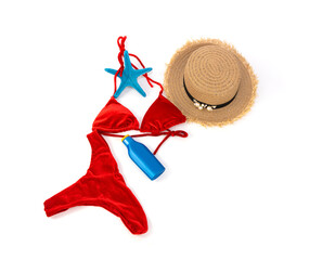 Fashion set in Summer holiday on the beach with a red bikini on white background