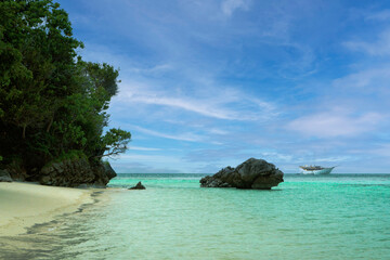 Advertising, Travel, Vacation and Holiday Concept - Beautiful view pristine beach in a small remote island
