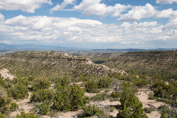 Fototapeta na wymiar Panoramic View. Scenic view of the canyon with greenery near Los Alamos, New Mexico.