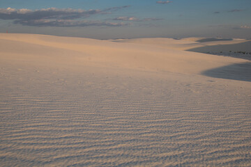 Fototapeta na wymiar White Sands National Monument. Scenic view of White Sands at sunset, New Mexico; these are dunes composed of sands of gypsum.