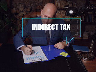 INDIRECT TAX text in block of quotes. Loan officer doing paperwork Indirect taxes can...