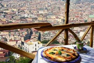 Poster       Italian pizza Margarita served on terrace with Naples view, Italy © elvirkin