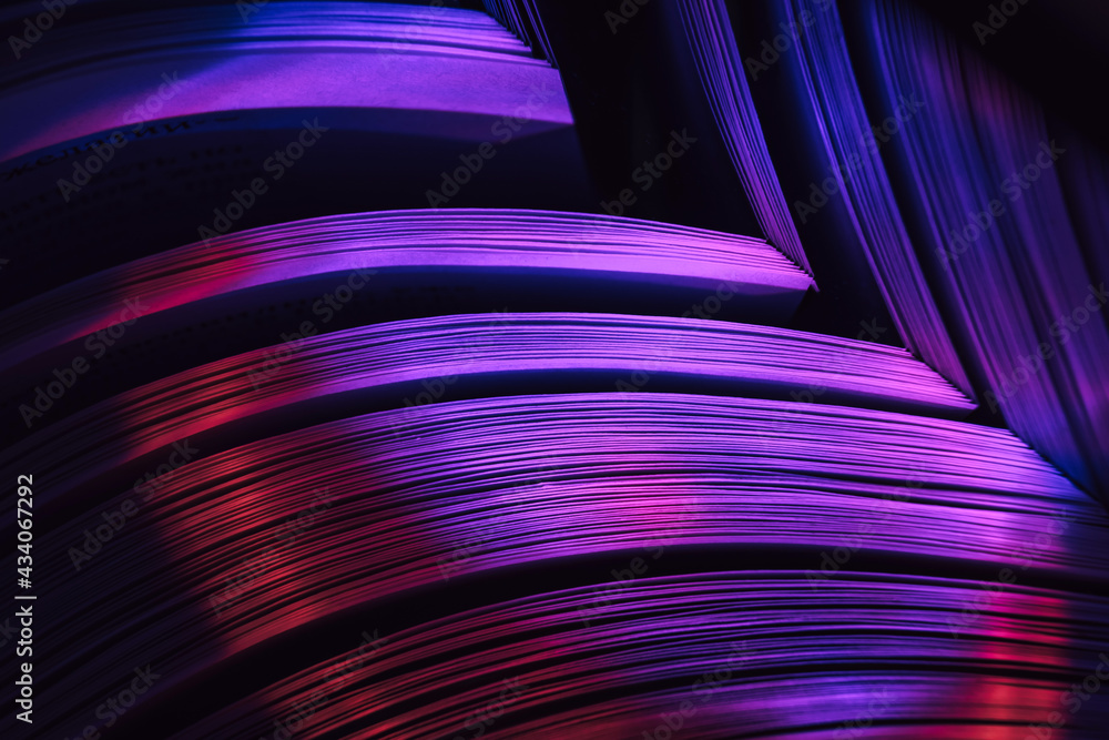 Aufkleber Close up Beautiful book pages in the color light on a night. Background pattern for design. Macro photography view.