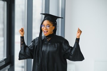 A pretty african american woman graduate