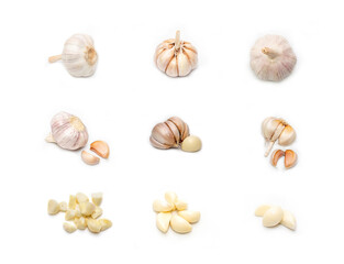 Set of fresh whole and sliced garlic isolated on white background. Image on top view.