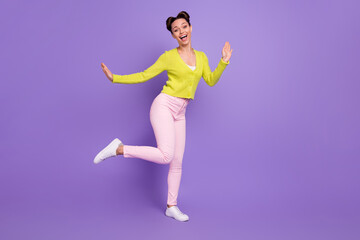 Fototapeta na wymiar Full length body size photo of girl with girlish hairstyle dancing cheerfully at party laughing isolated on pastel violet color background