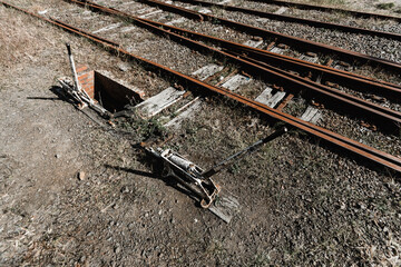 A lever used on an abandoned historic vintage railroad used to switch tracks