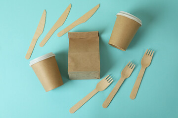 Food delivery disposable tableware on blue background