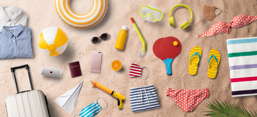 Naklejka na ściany i meble Flat lay top view of travel essentials, summer holiday concept.